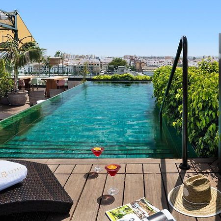 Hotel Lobby Seville Luaran gambar Rooftop pool
