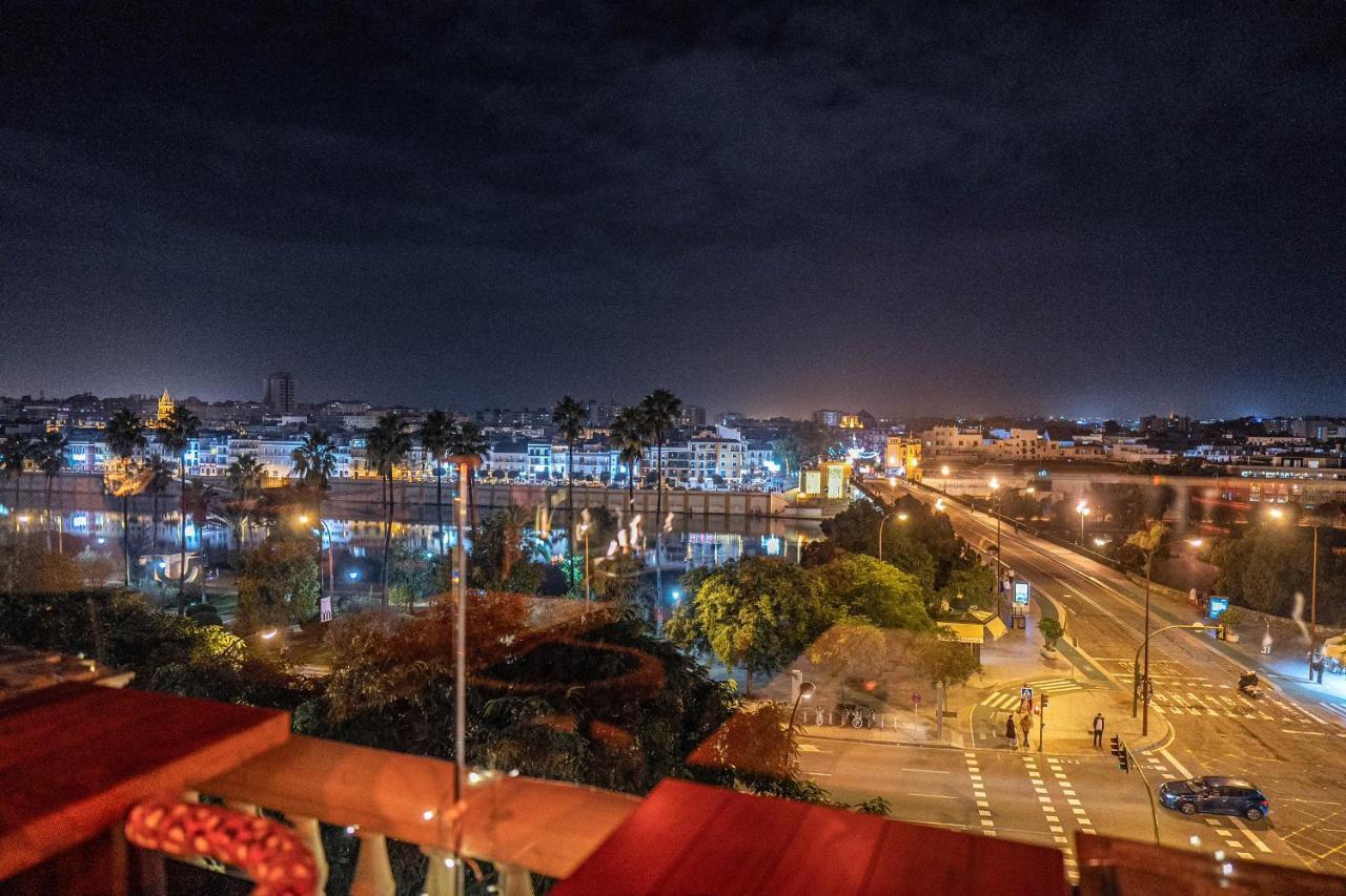 Hotel Lobby Seville Luaran gambar Rabat at night